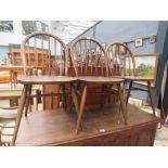 Three stickback elm seated dining chairs