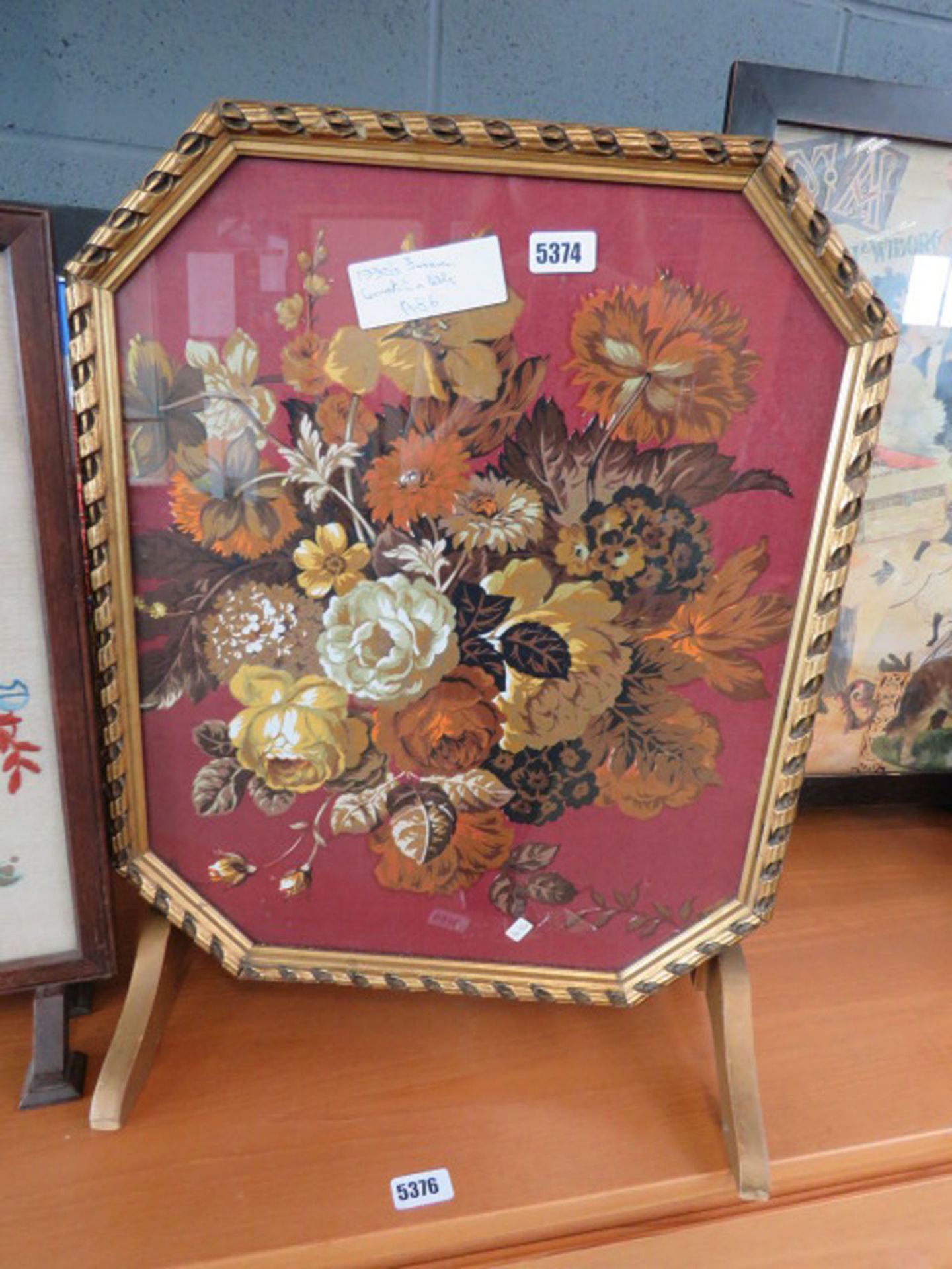 Firescreen with floral tilting panel