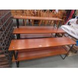 Three teak and metal display racks