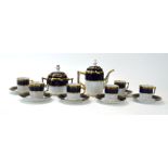 RR 417 - An Austrian Ernst Wahliss porcelain tea service comprising tea pot, sugar bowl, six cups