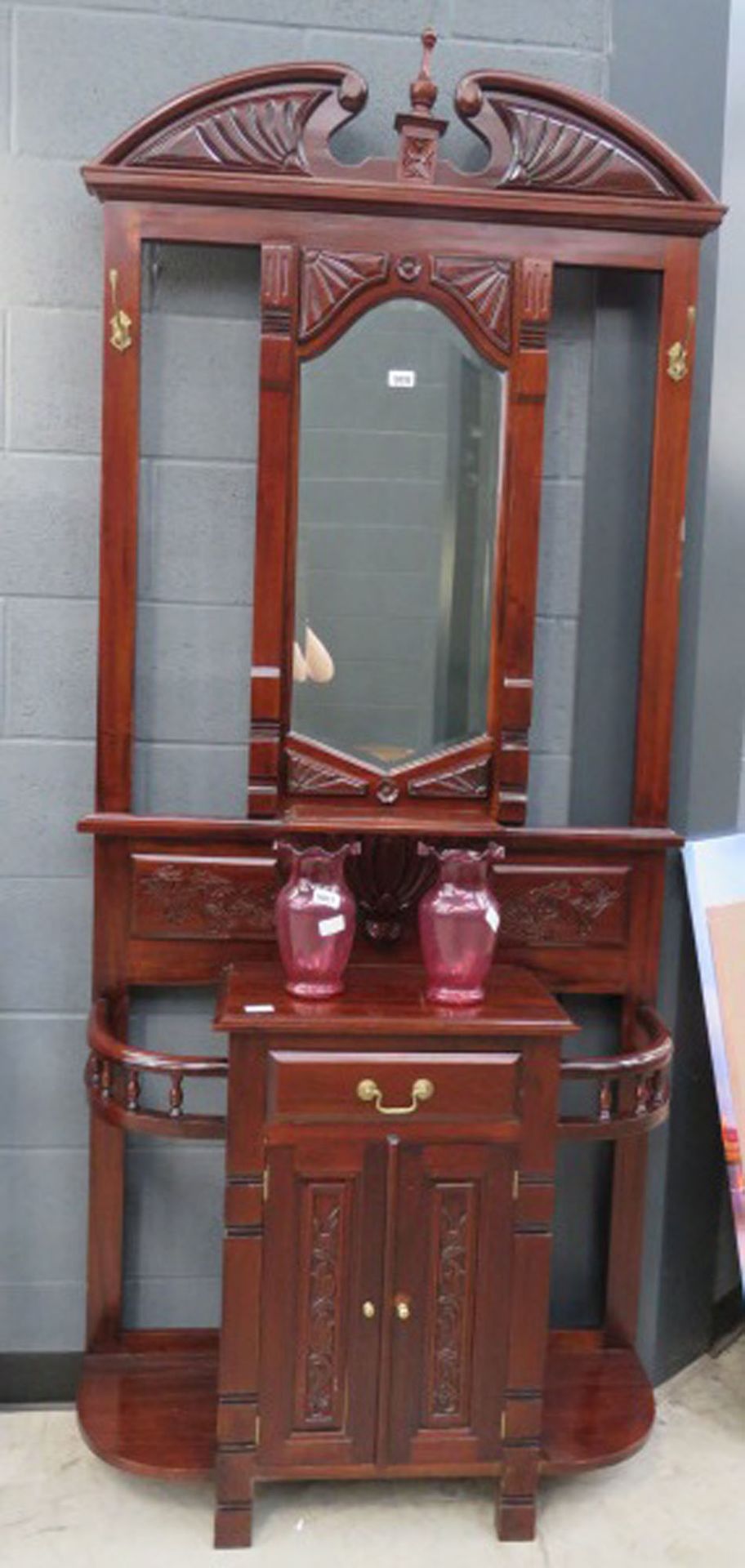 Dark wood hall stand with central mirror
