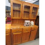 Pine dresser with glazed doors