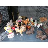 Cage containing brass candlesticks, pots and ornamental horse figures