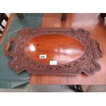 Carved wooden serving tray