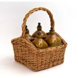 RR 122 - A set of four two-tone stoneware flagon's labelled 'Scotch Whisky', 'Brandy', 'Gin' and '