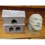 Pottery bust of a bearded man plus a two story house