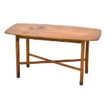 30 (4/6) A 1960's walnut and marquetry occasional table of cushioned rectangular form decorated with