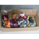 Box containing Russian doll with Disney and other ornamental figures