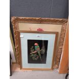 Embroidery of a parrot plus a canvas of a still life with flowers