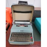Cased Olivetti typewriter