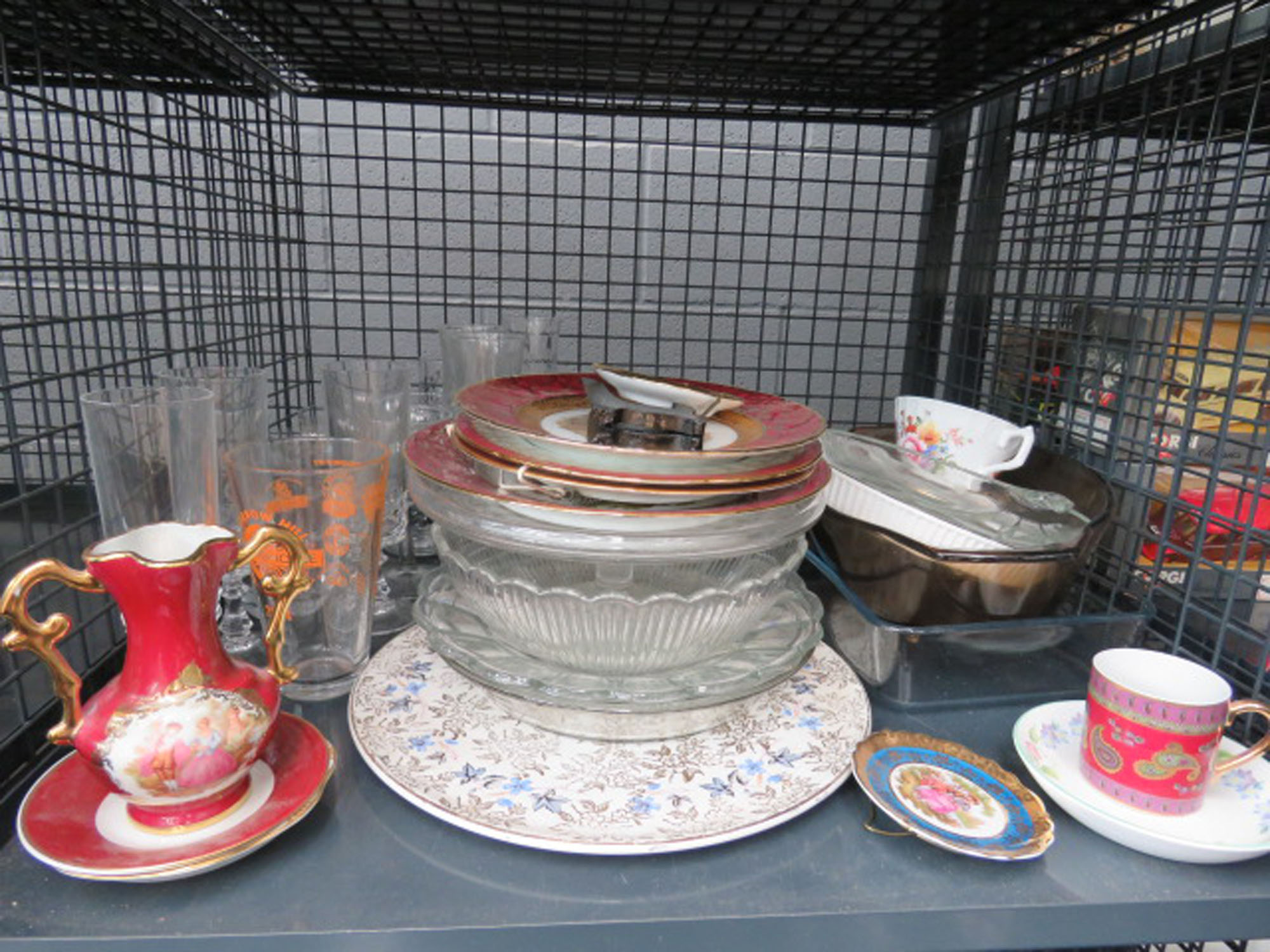5547 cage containing glassware and general crockery