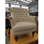 Oatmeal fabric button back armchair