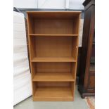 5150 Walnut finished open fronted bookcase