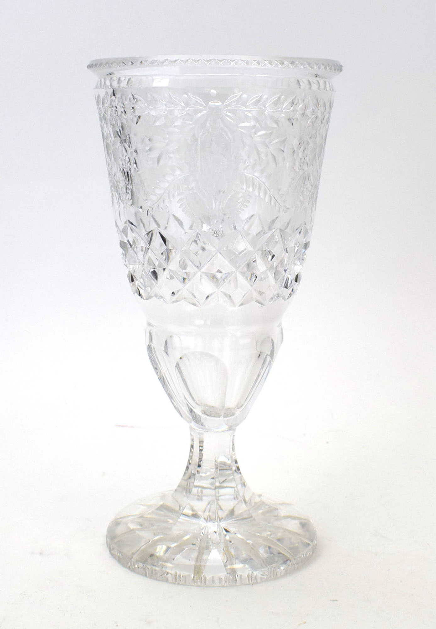 RR 414 - A Continental cut glass goblet of typical form engraved with ferns and stylised flowers