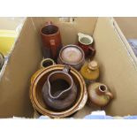 Box containing pottery jugs and storage vessels