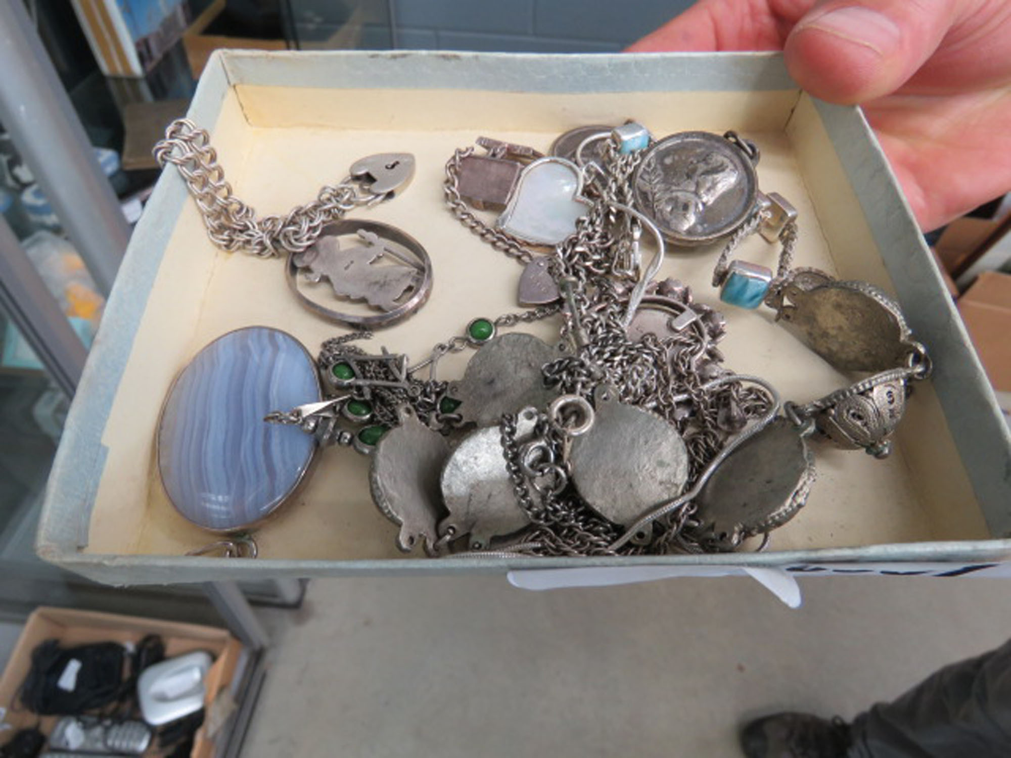 Box containing a small qty of silver plate and silver jewellery