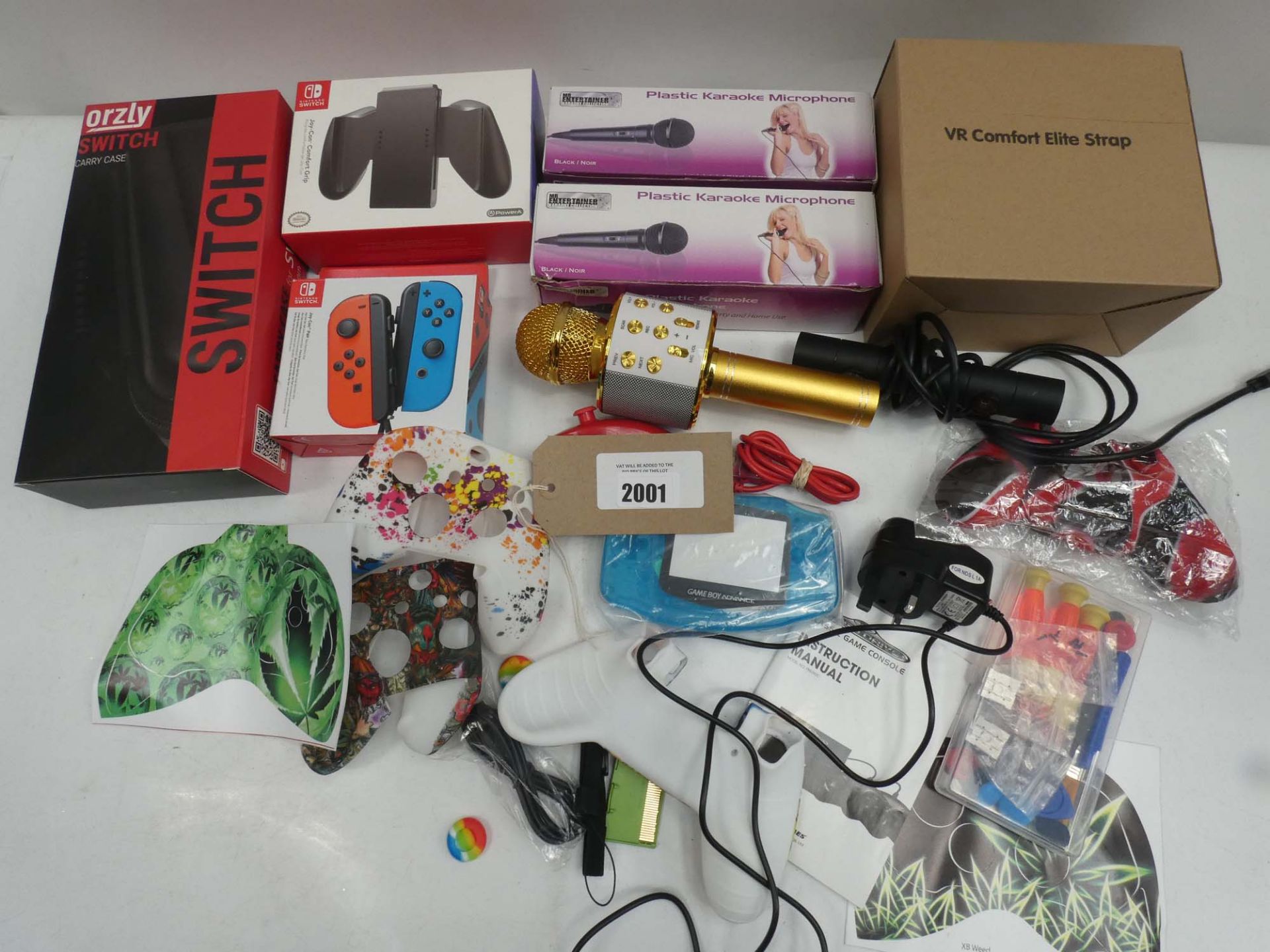 Bag containing gaming accessories; Switch case, Joycon controller, Joycon grip, controller