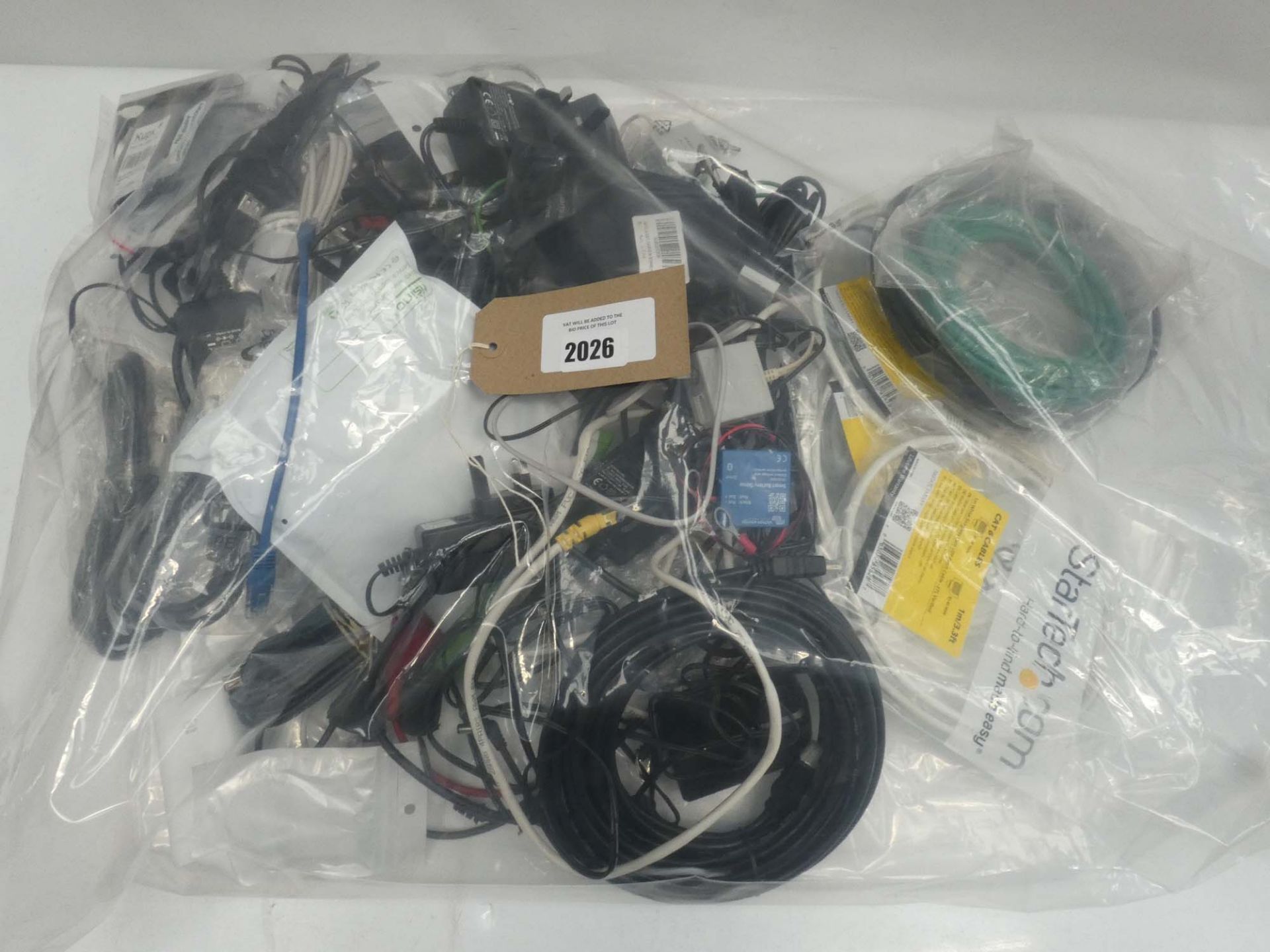 Bag containing quantity of cables, leads and PSUs