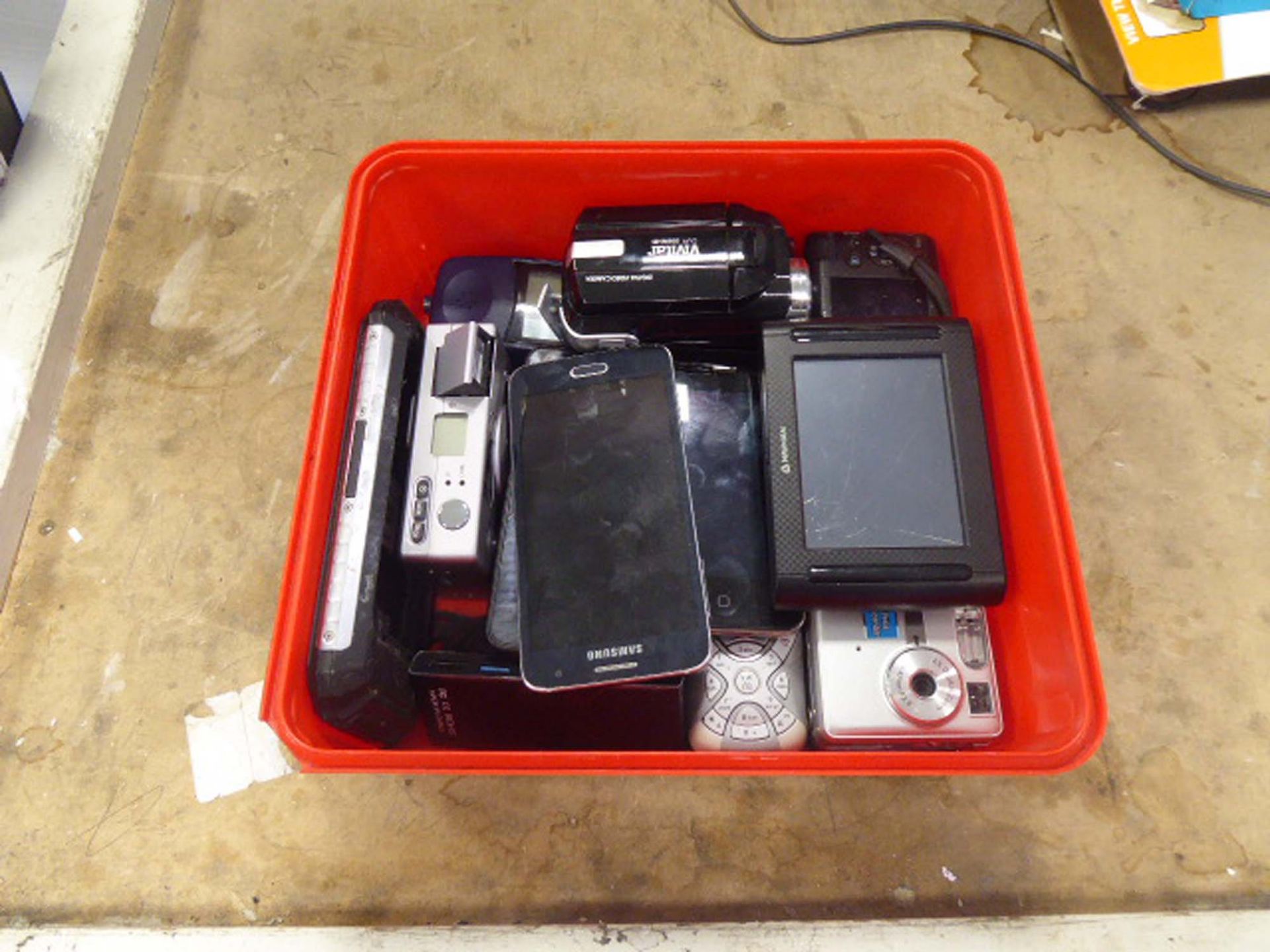 Box containing selection of mobile phones, digital cameras and other items for spares/repairs