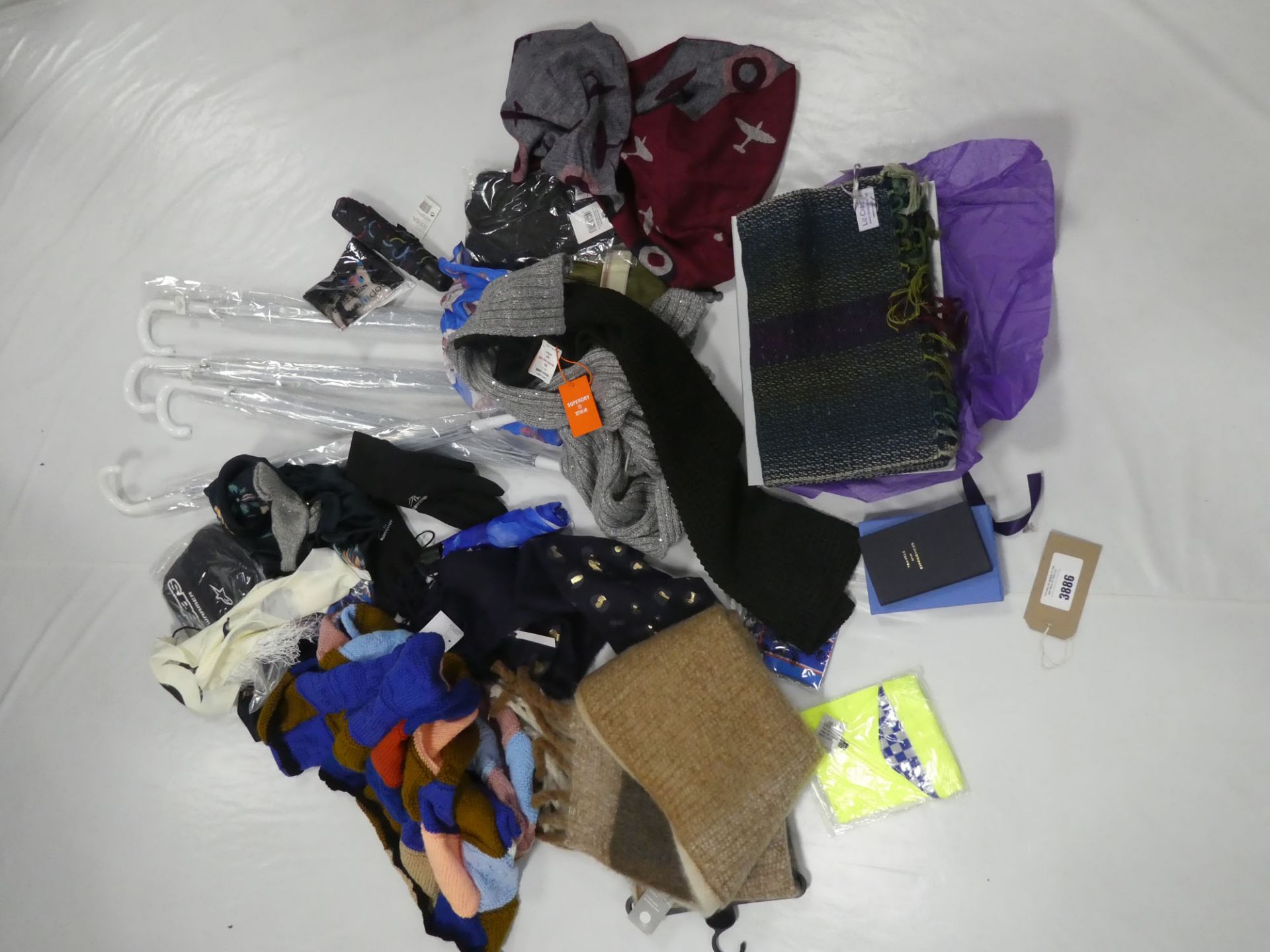 Selection of accessories to include scarfs, umbrellas, gloves, etc