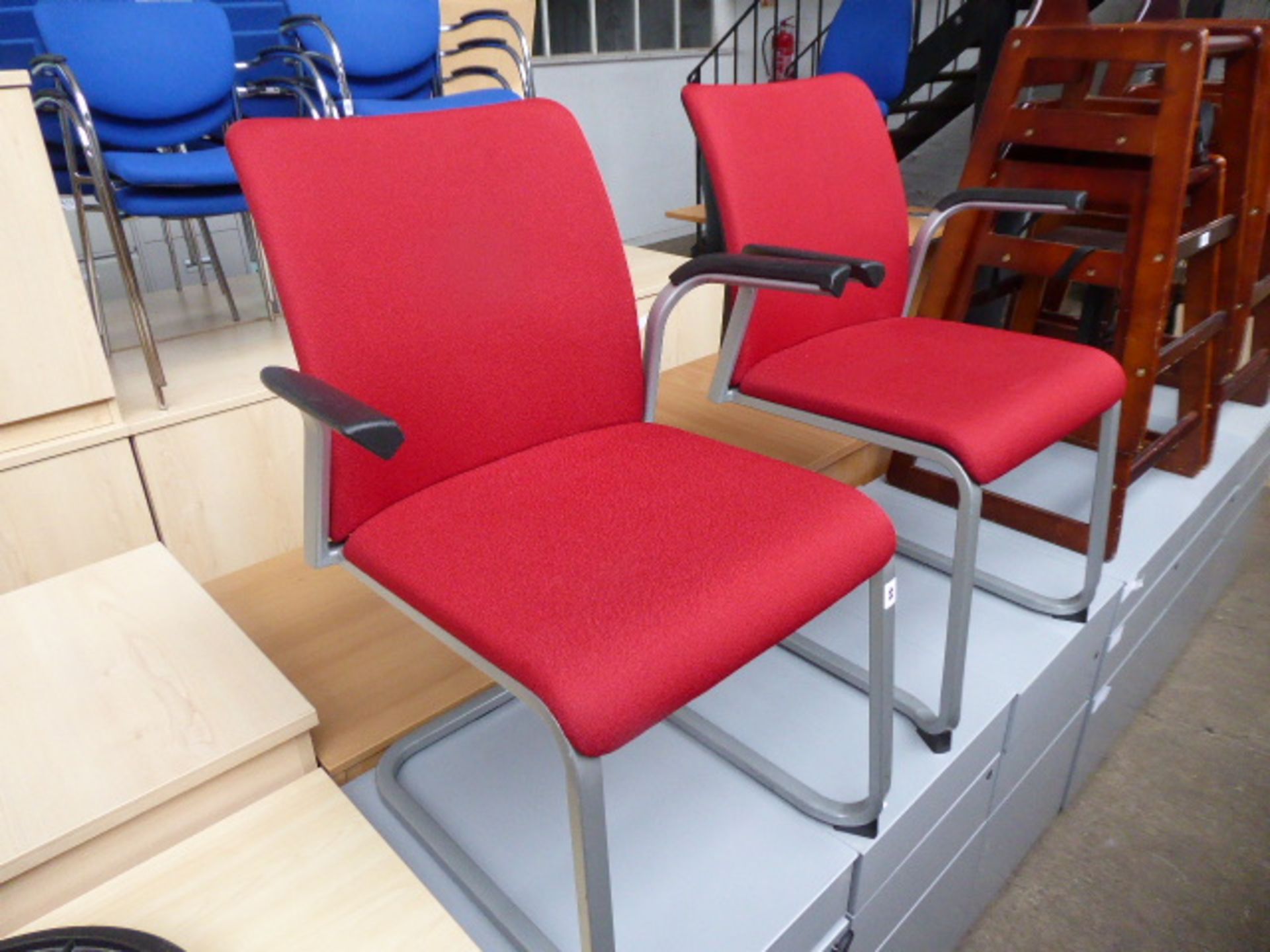 2 Steelcase metal frame and red cloth cantilever chairs