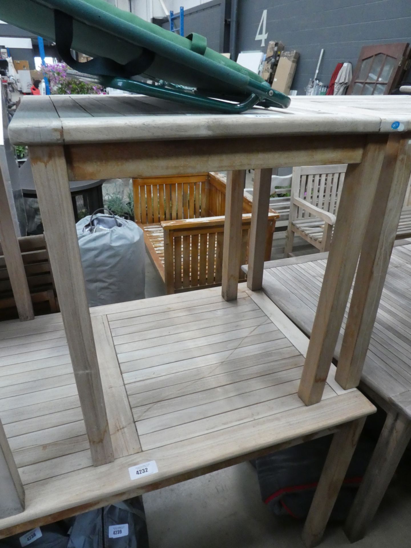 Small slatted wooden teak garden table