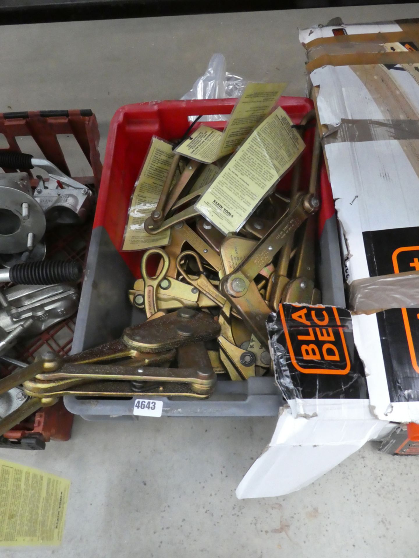 Crate of Klein tools, lifting grips