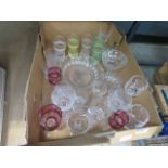 Box containing glass tumblers, wine glasses and bowls