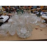 Large group of glassware and crystal to include brandy snifters, basket, fruit bowls, tumblers and