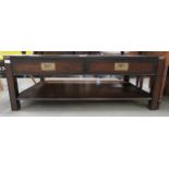 Dark wood coffee table with two drawers and shelf under