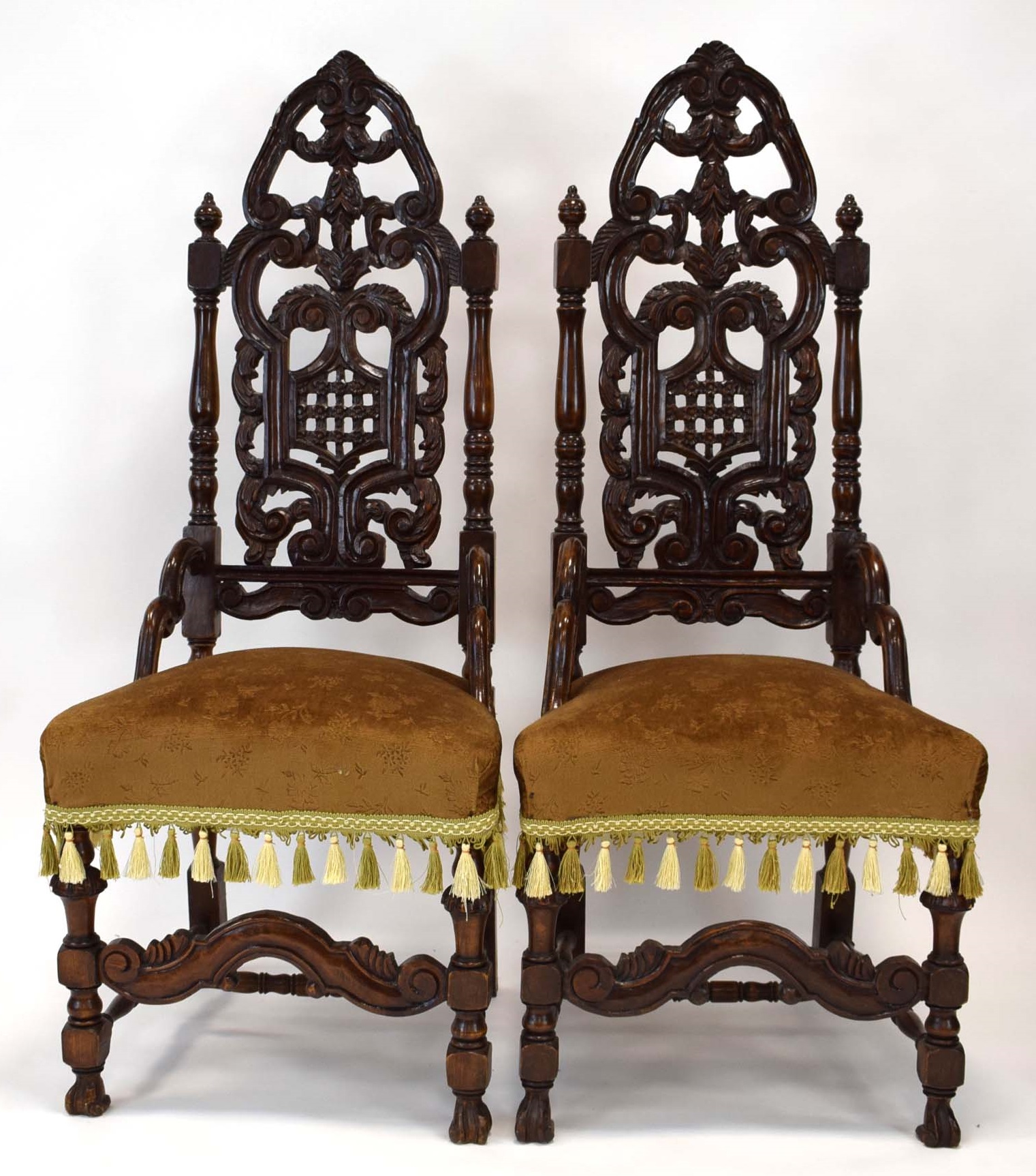 2123RR 9 A pair of 17th century style carved oak hall/side chairs with high backs, upholstered seats