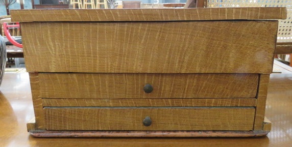 Veneered collectors box with hinged lid and two drawers under