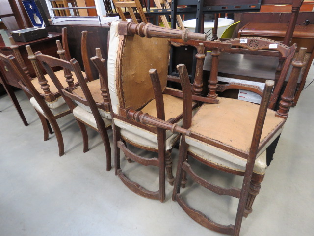 Eight carved oak dining chairs with upholstered seats