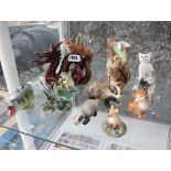 Half shelf of various animal themed ornaments incl. Hornsey Fauna deer, Oriental style dragon,