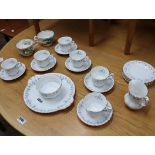 6 sitting tea service by Royal Albert in the Memory Lane pattern with 2 Royal Albert bone china mugs