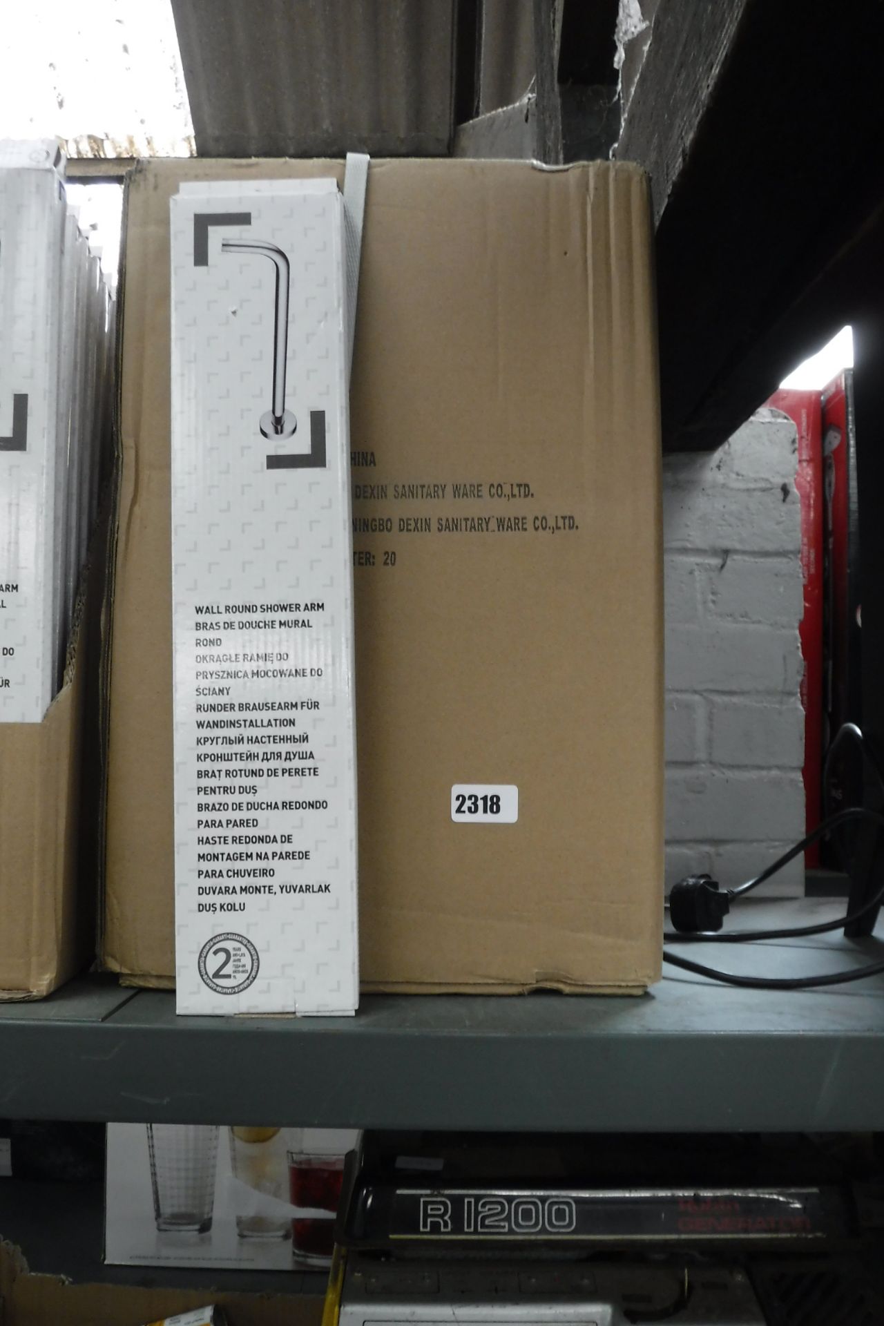 2311 2 boxes containing 40 wall-round shower arms