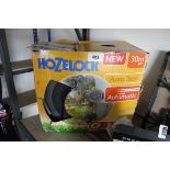 Boxed Hozelock 30m wall mounted hose reel and hose