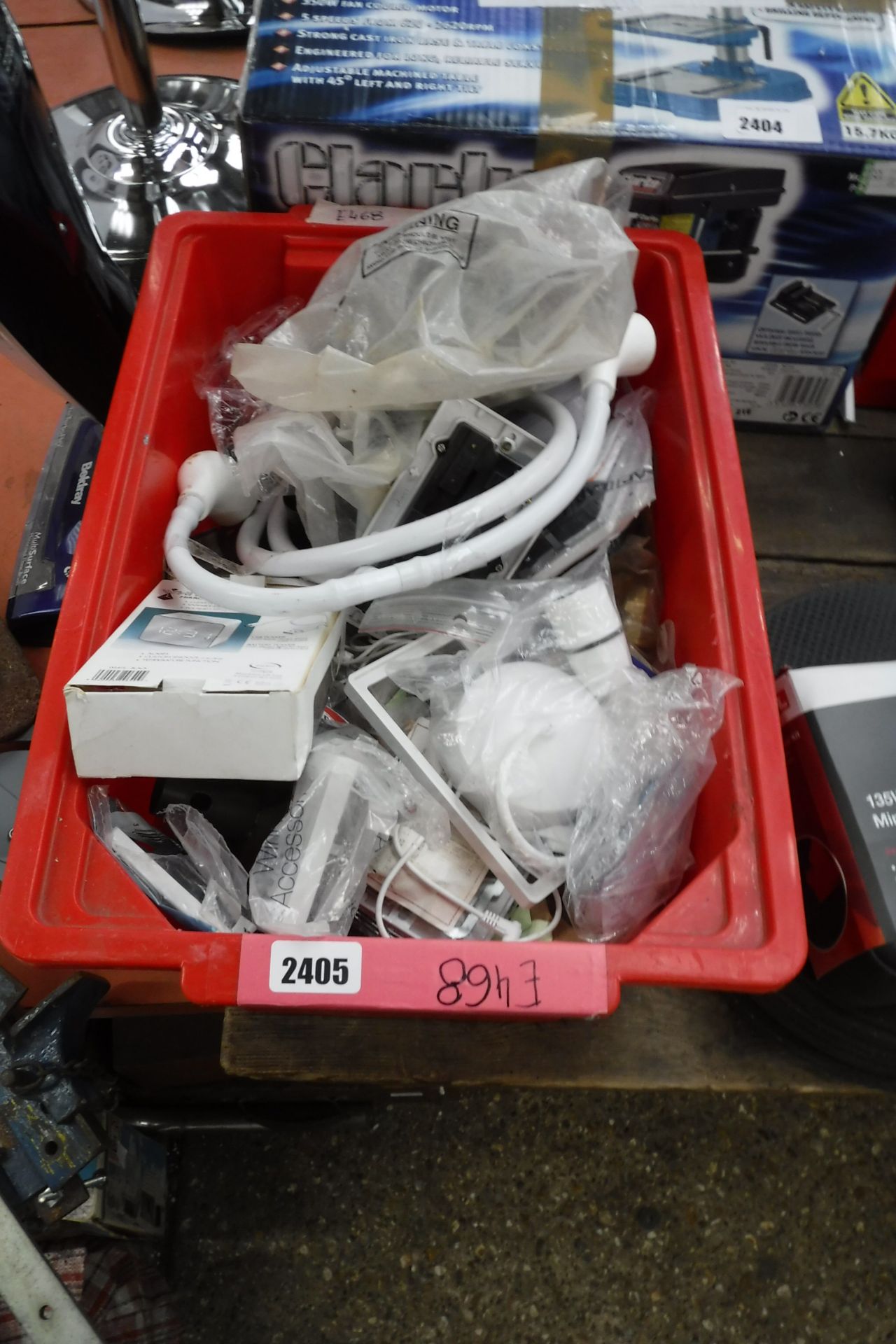Box of various spares incl. switches, light fittings, shower hose etc.