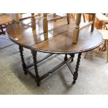 2156 Dark oak oval dropside dining table