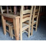 Pine rectangular dining table with 4 rush seated chairs