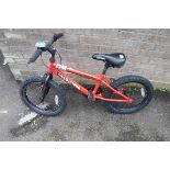 Childs Apollo Outrage mountain bike in red