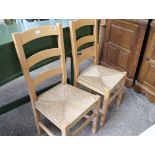 Pair of rubberwood rush seated dining chairs