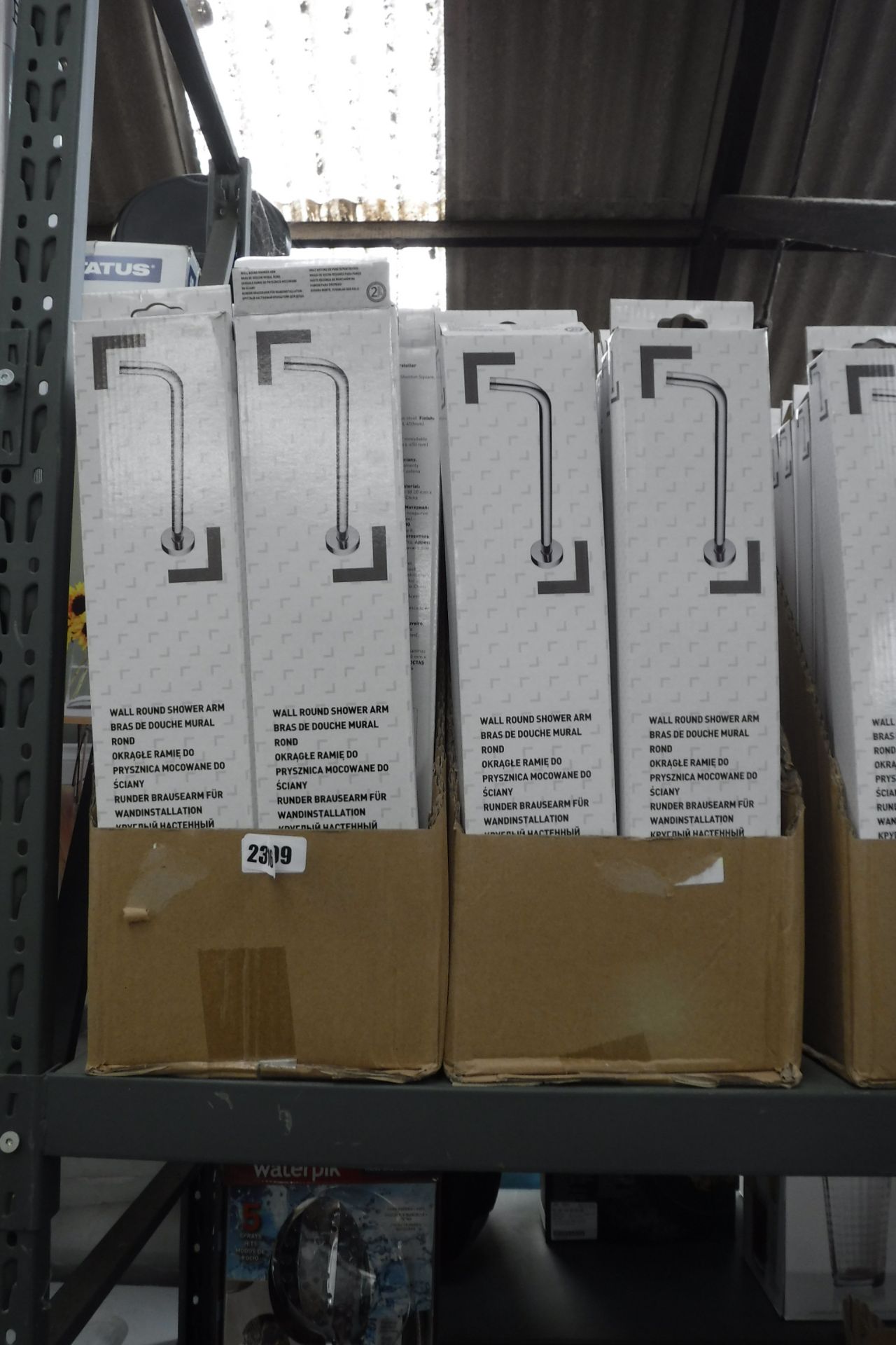 2309 2 boxes containing 40 wall-round shower arms