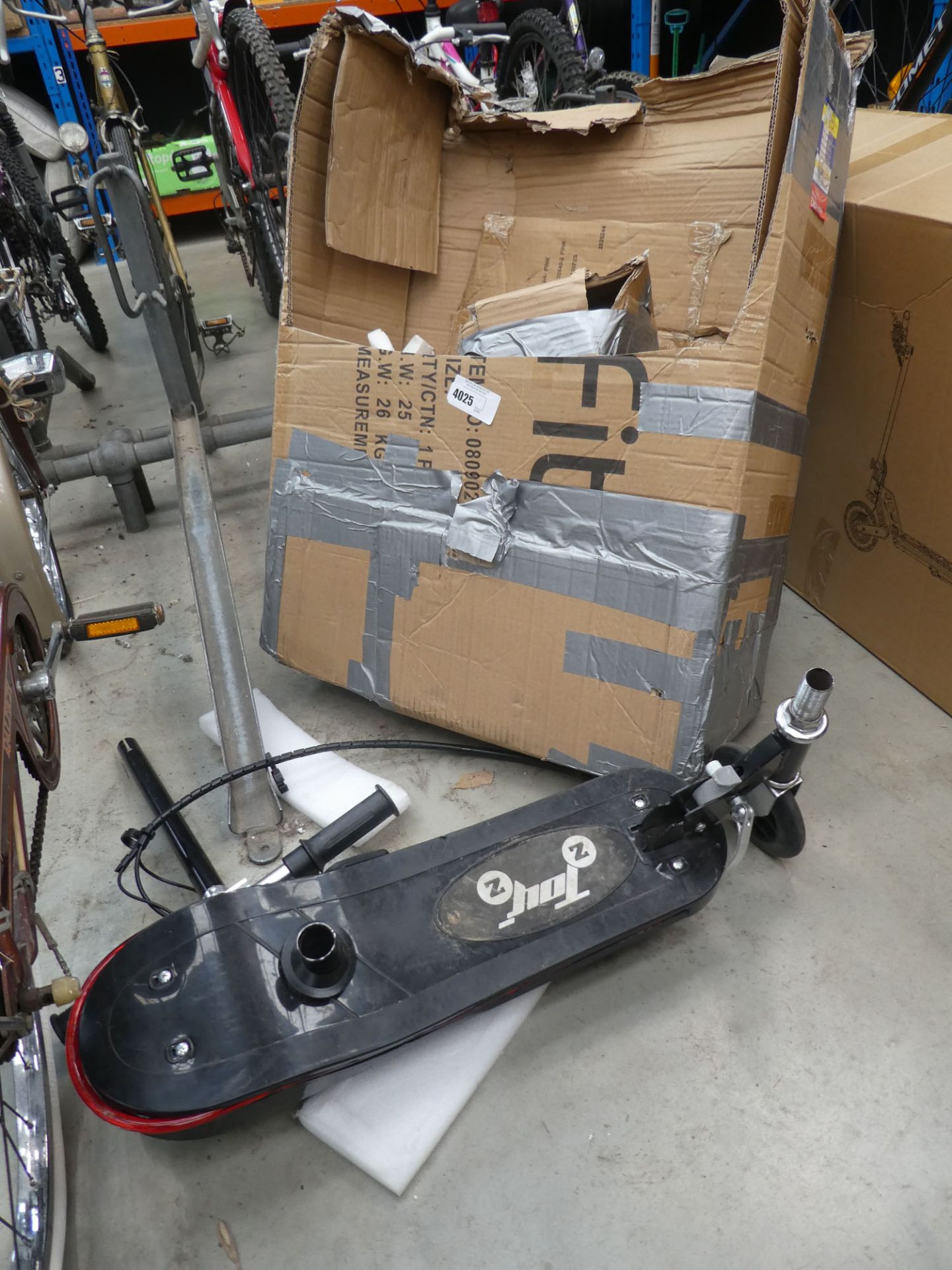 Boxed Toyz electric scooter in parts