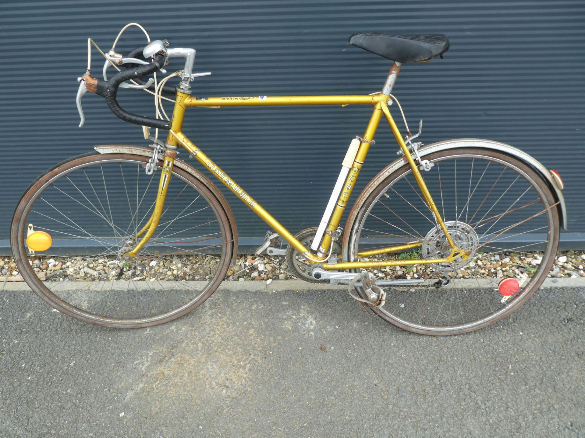 Vintage gold racing cycle