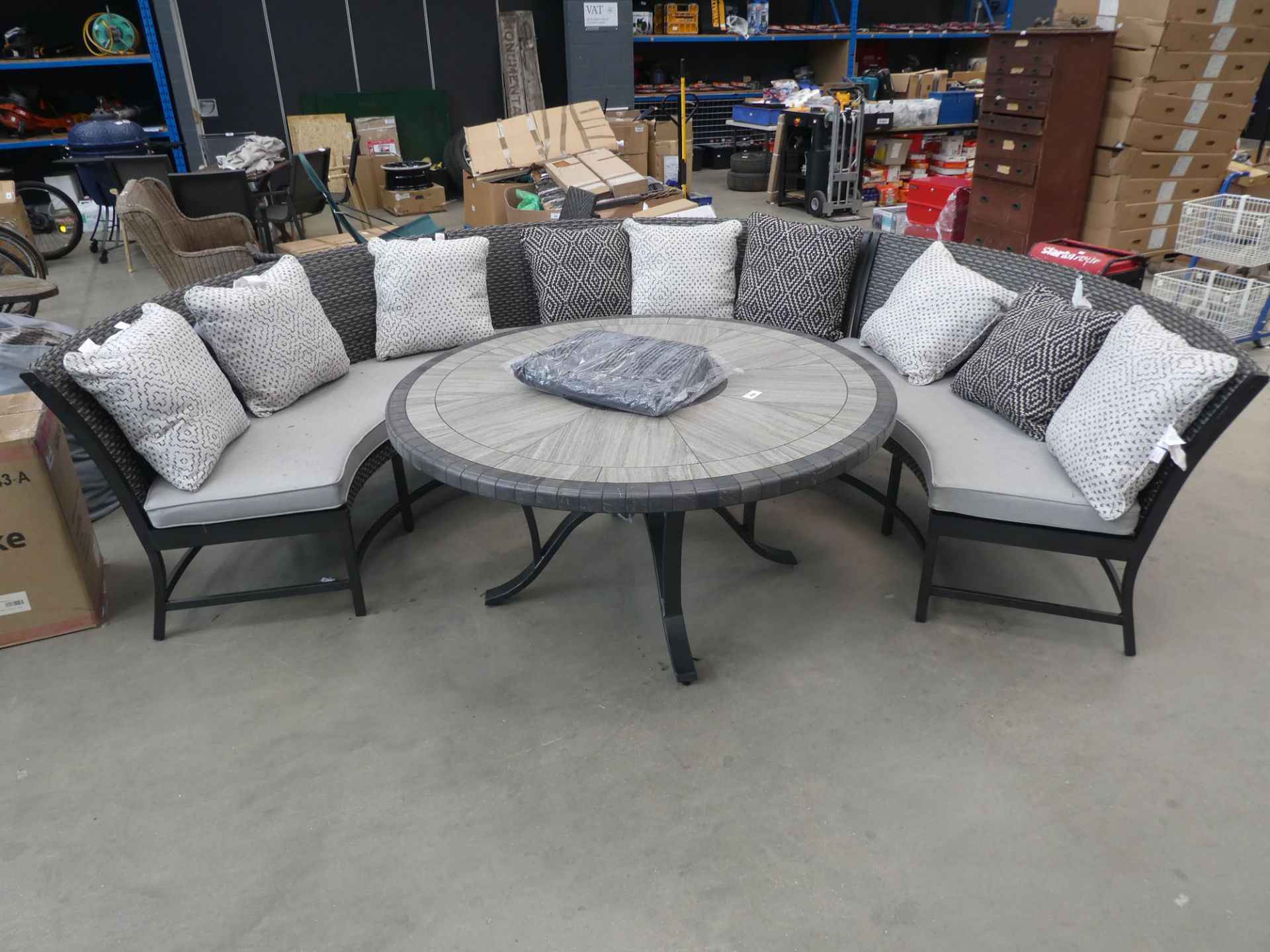 Large semi circular garden seating set with large round tile top table and cushions