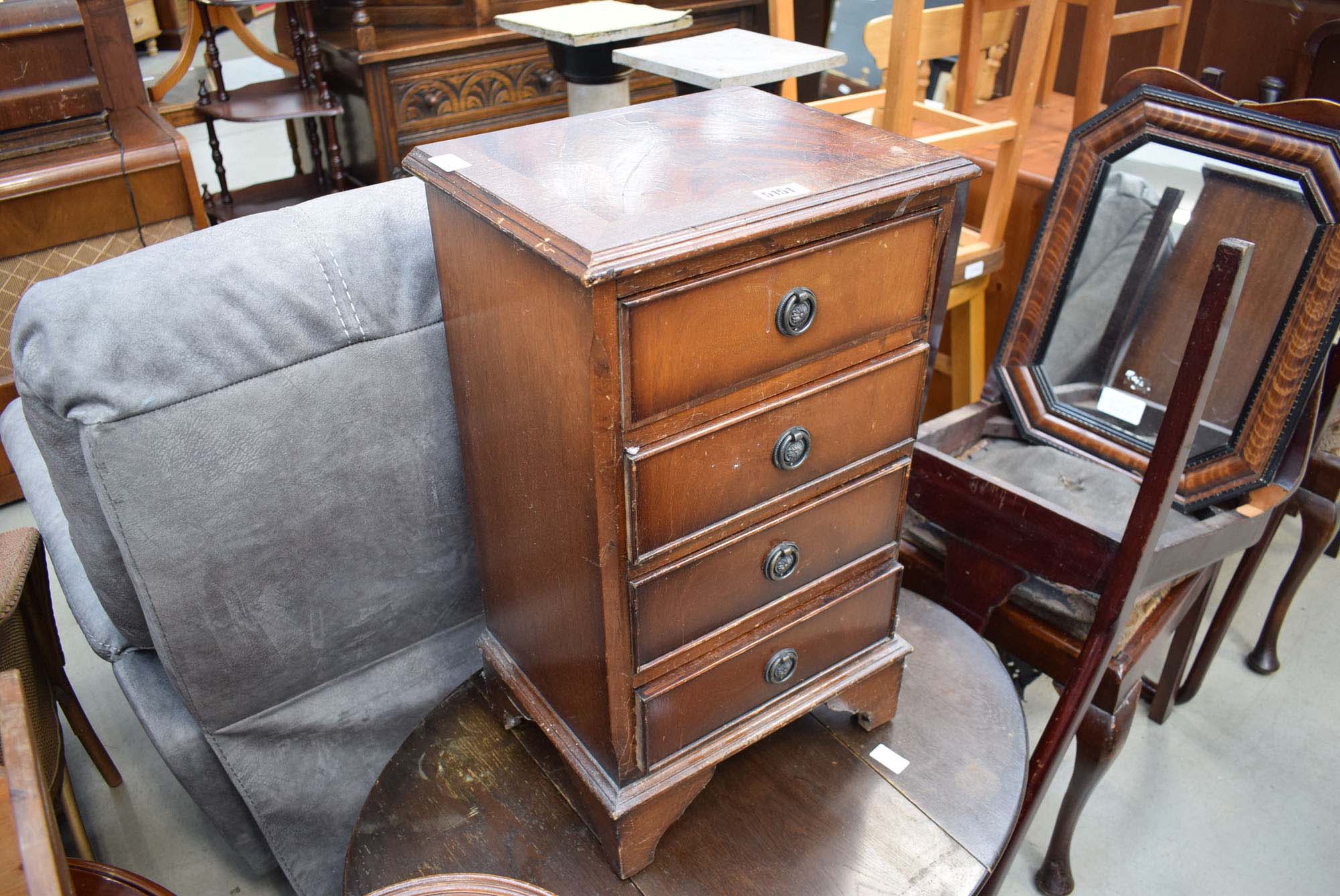 Small reproduction mahogany four drawer cabinet