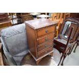 Small reproduction mahogany four drawer cabinet