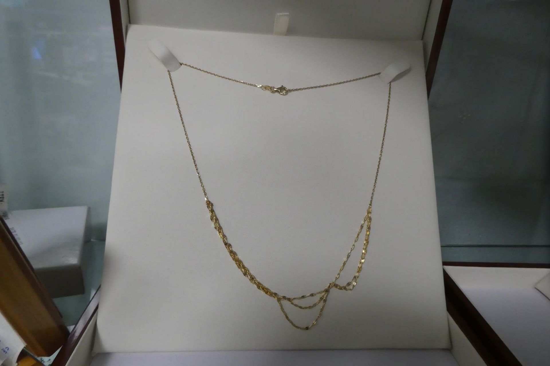 14k marked '3 Strand' necklace with case