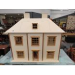 Cream painted dolls house